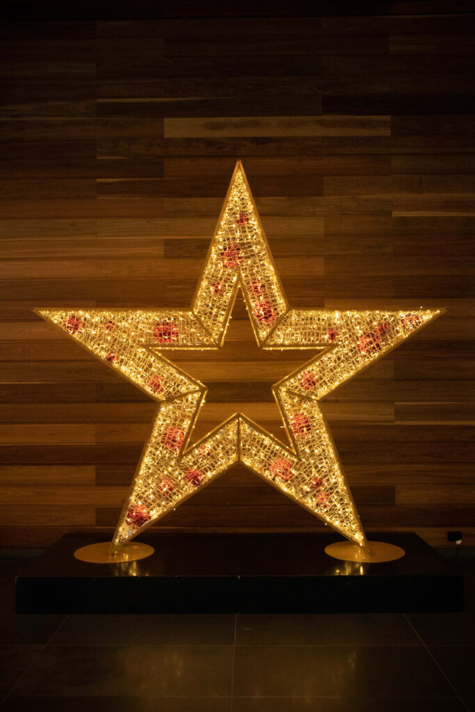 Glowing Christmas Star Wallpaper: Magical Holiday Decor Background