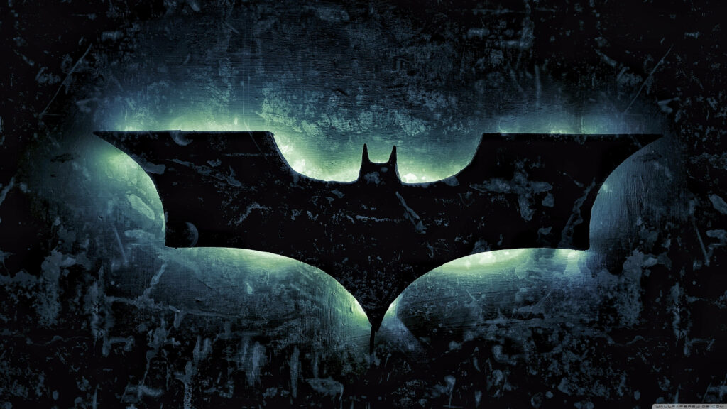 Epic Batman Symbol in 4k Resolution: A Dynamic Light Pattern Envelops the Iconic Logo Against a Dark Background Wallpaper
