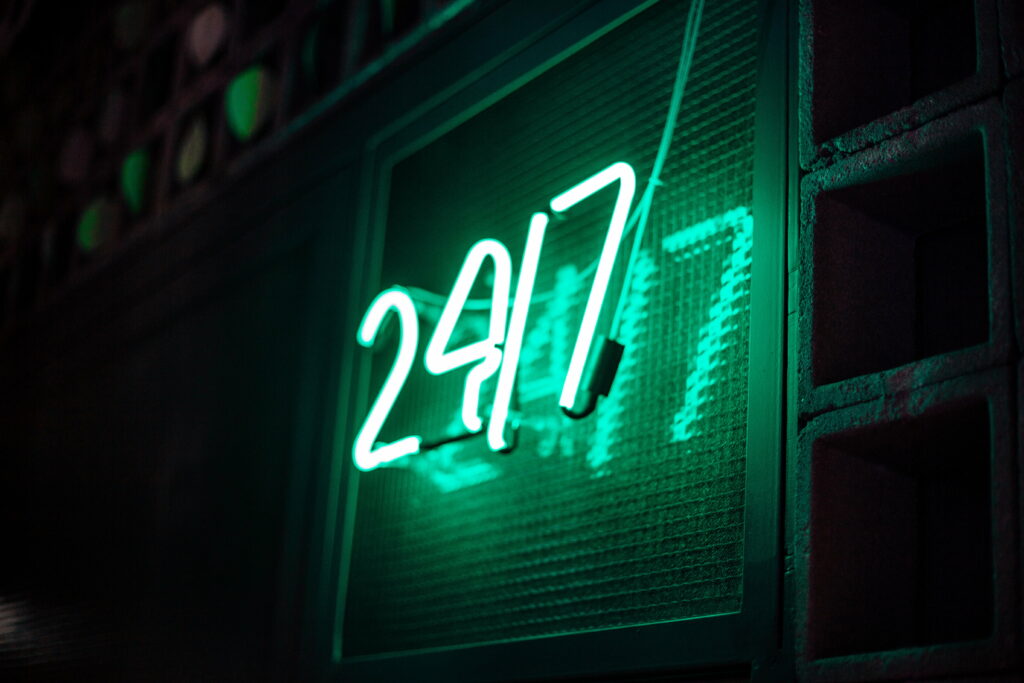 Glowing Green Neon Signboard: Mesmerizing 5K Wallpaper with Illuminated Numbers