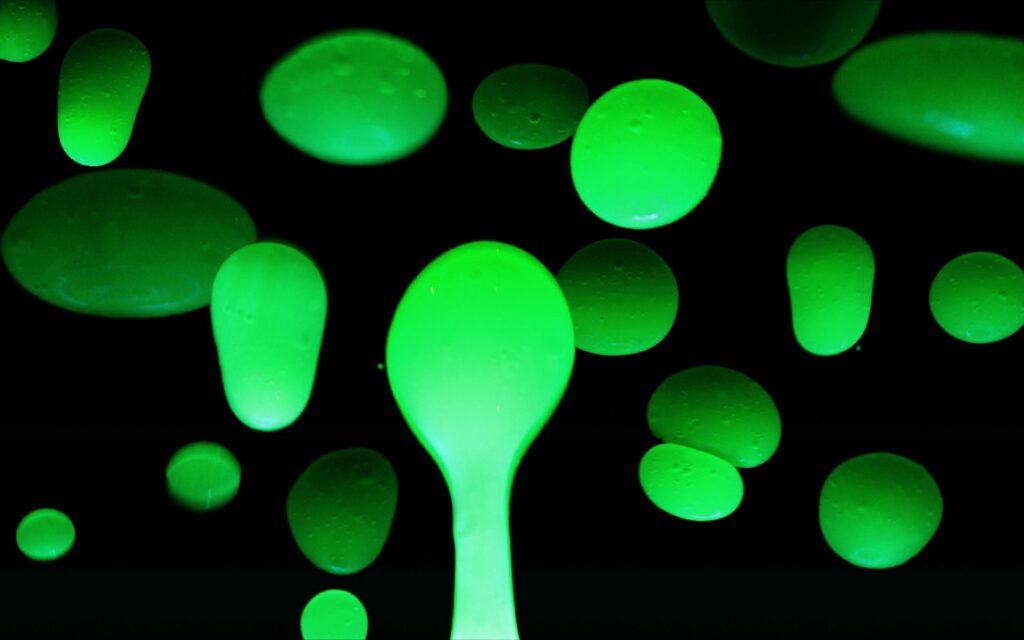 Glowing Green Bubbles Wallpaper - Mysterious Dark Background