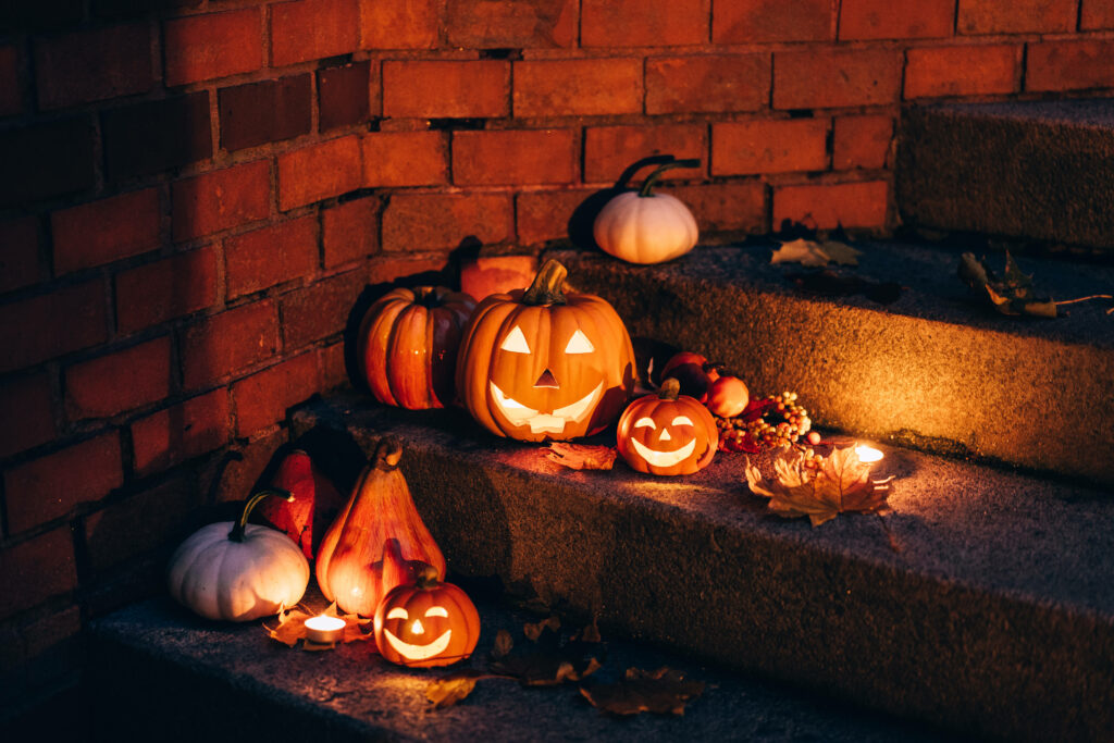 Glowing Jack-o'-lantern Ensemble Brightens Up Spooky Staircase: Halloween Computer Wallpaper