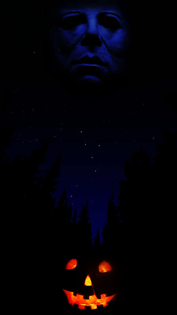 Halloween Night: Michael Myers in Eerie Silhouette with Glowing Jack-O'-Lantern Wallpaper