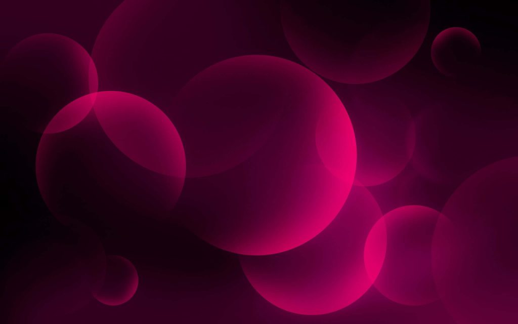 Glowing pink bubbles floating on black background digital abstract wallpaper background design