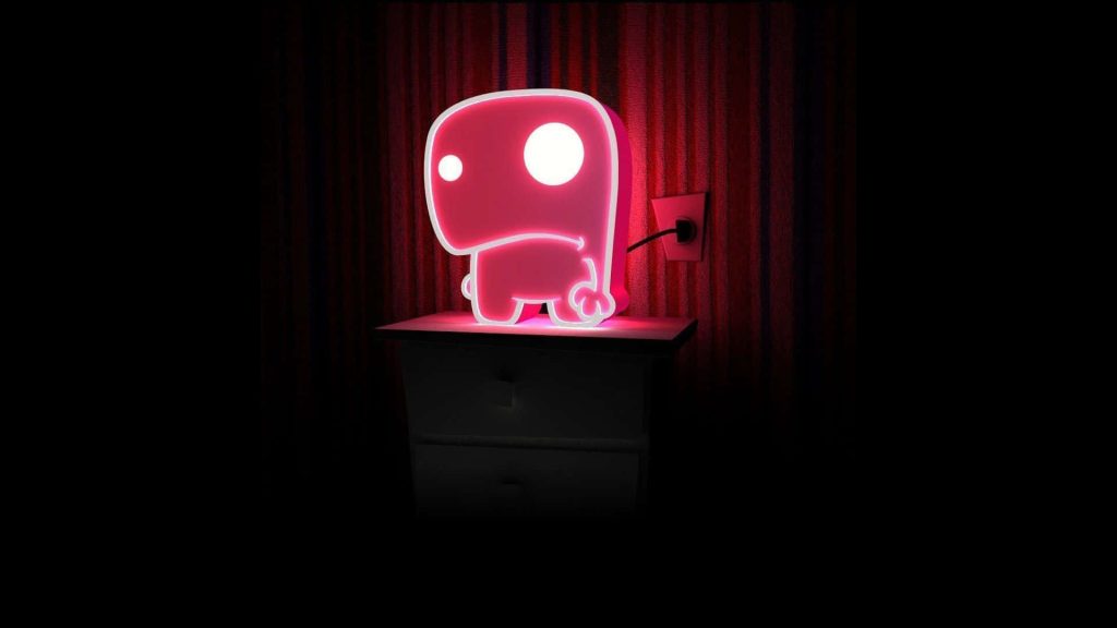 Black neon wallpaper with glowing pink cartoon creature on bedside table minimal background