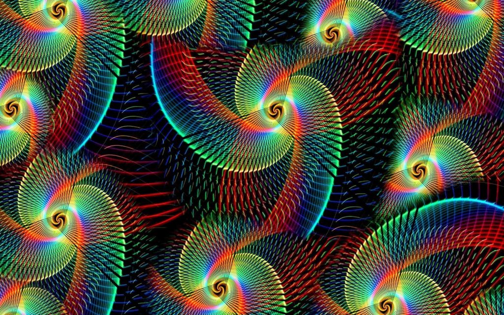 Glowing rainbow spiral swirls on black background vibrant swirl wallpaper digital art pattern