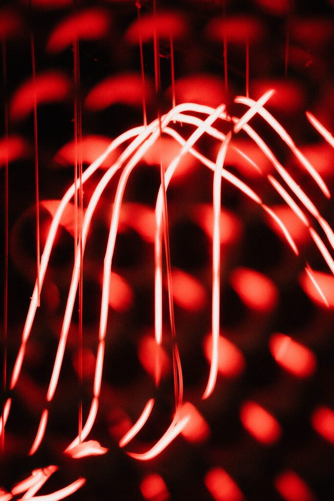 Stunning Abstract Wallpaper with Glowing Red Streaks on Dark Background