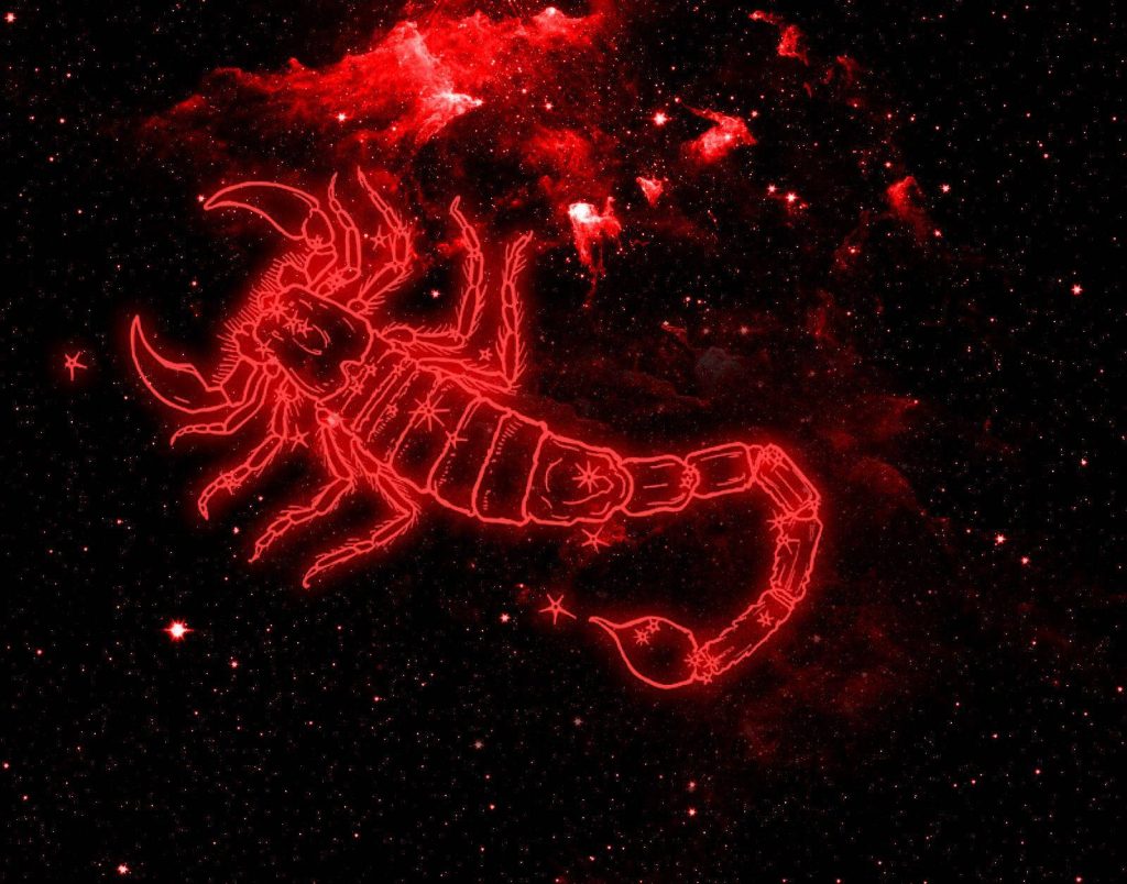 Red glowing Scorpio digital art on deep space nebula zodiac wallpaper background celestial theme