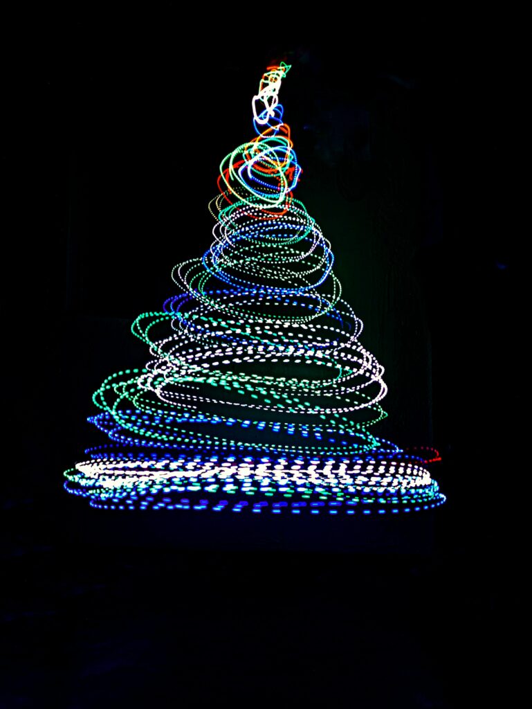 Vibrant Long-Exposure Freezelight Wallpaper: Glowing Tree Design