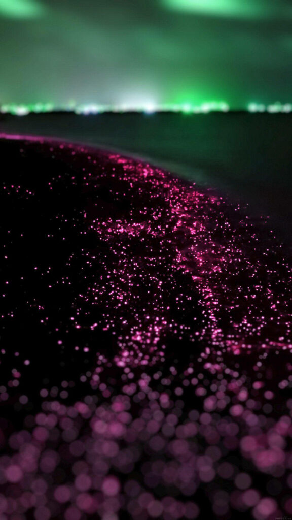 Glowing Waters: Illuminated Realm with Vibrant Pink Hues and Luminescent Green Sky - High Quality Android Wallpaper