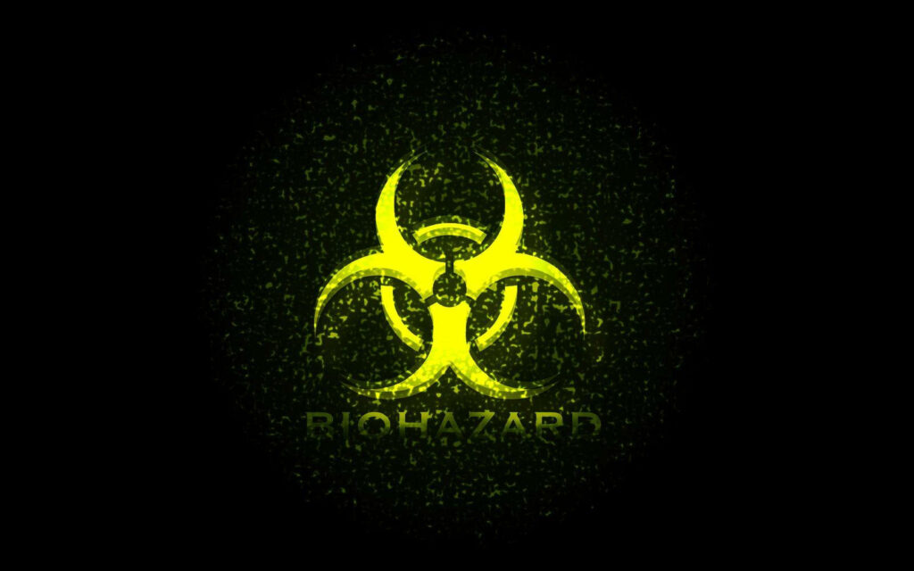A Striking Minimalistic Dark Surface Highlighting the Bold Yellow Biohazard Symbol Wallpaper