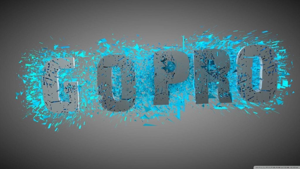 GoPro logo shattering into vibrant cyan fragments on dark sleek digital art wallpaper background