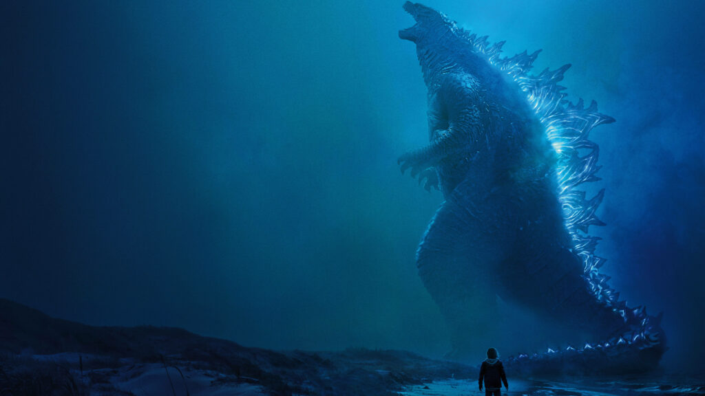 Godzilla's Menacing Spines: A Blue Luminescent Display of Power Wallpaper