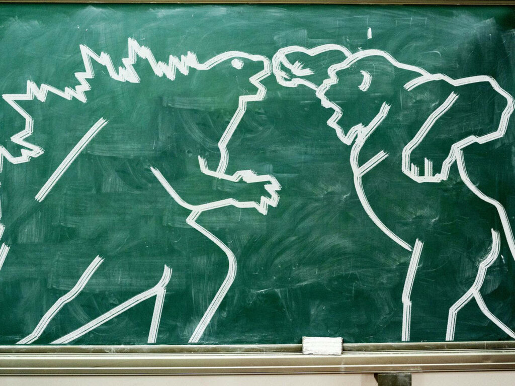 Chalkboard wallpaper with white chalk outlines of Godzilla and Kong epic showdown on green background