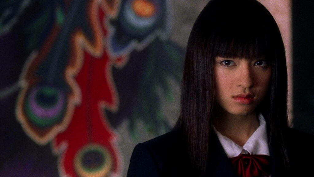 Gogo Yubari Kill Bill assassin intense look striking background wallpaper image