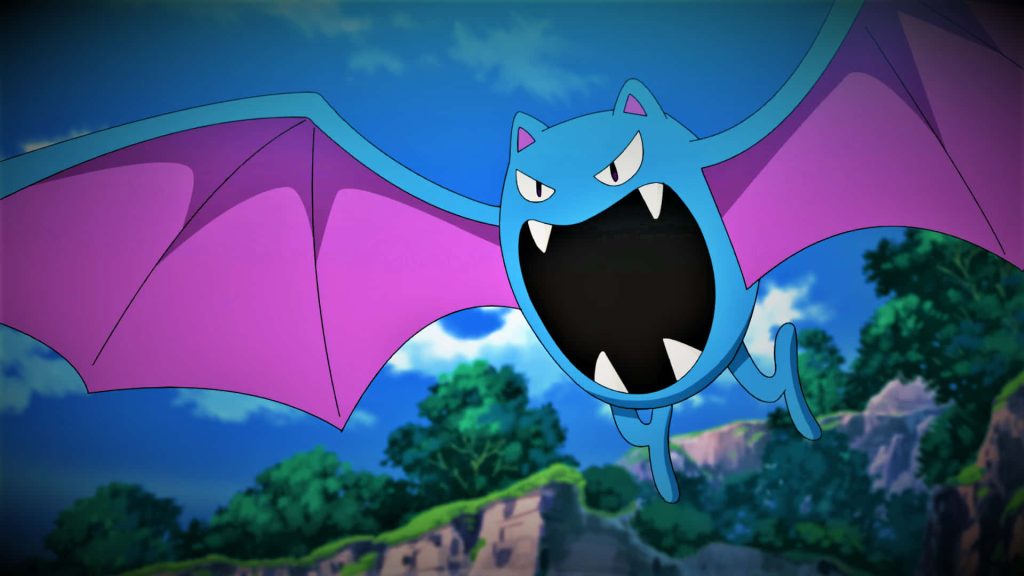 Golbat flying high over lush forest anime-style Pokémon wallpaper background vibrant HD