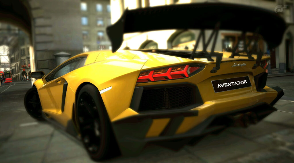 Gold Lamborghini Aventador with spaceship-inspired rear and sporty spoiler on city streets wallpaper