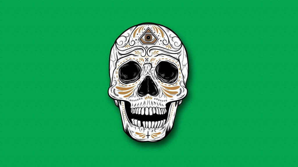 Elegant Day of the Dead: A golden-patterned skull against a vibrant green backdrop Wallpaper