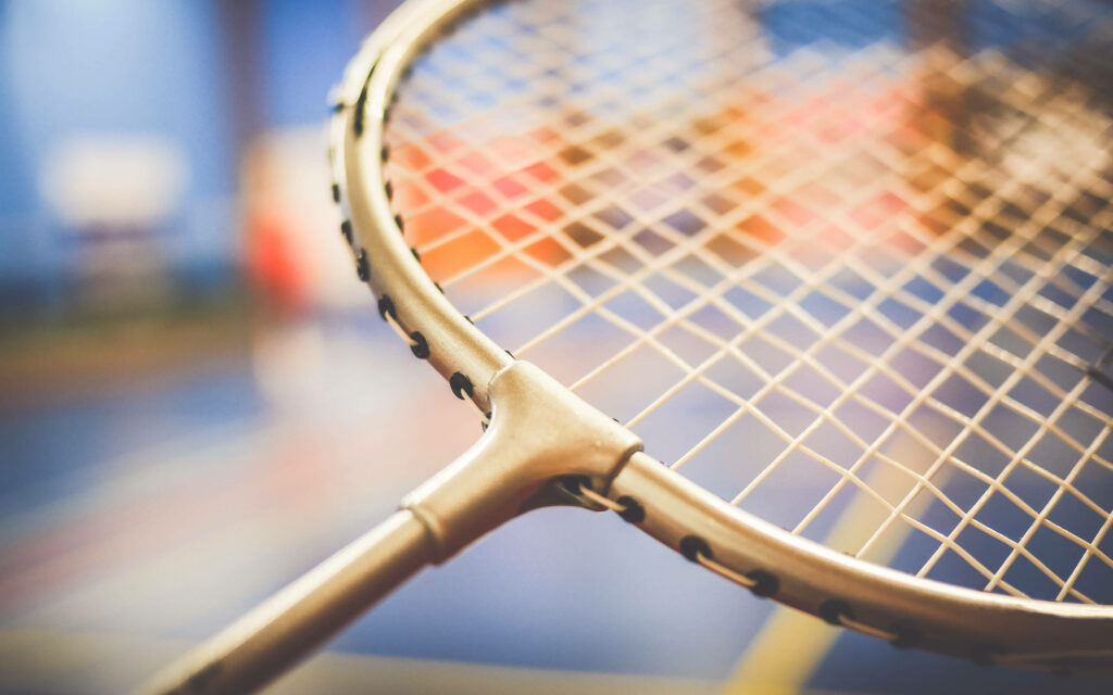 Golden Elegance: Capturing the Beauty of a Badminton Legend Wallpaper
