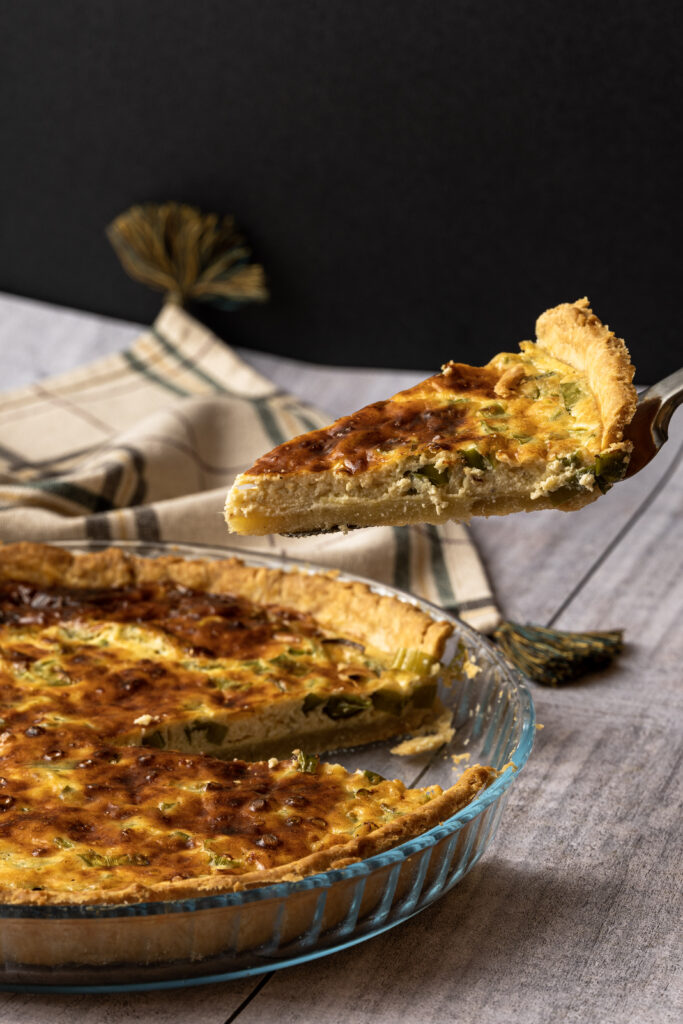 Delicious Golden-Brown Cheese Quiche: Rich Texture & Flaky Crust Wallpaper