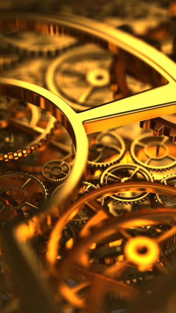 Close-up of golden gears clockwork mechanism with warm lighting and soft depth of field background Wallpaper