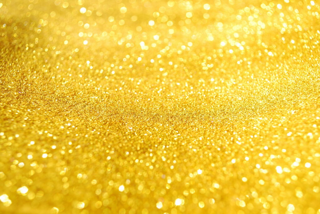 Glistening Gold: A Glittering Abstract HD Wallpaper Background Photo with Shiny Yellow Tones