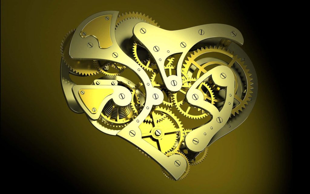 Golden mechanical heart with intricate 3D gears on black steampunk industrial wallpaper background
