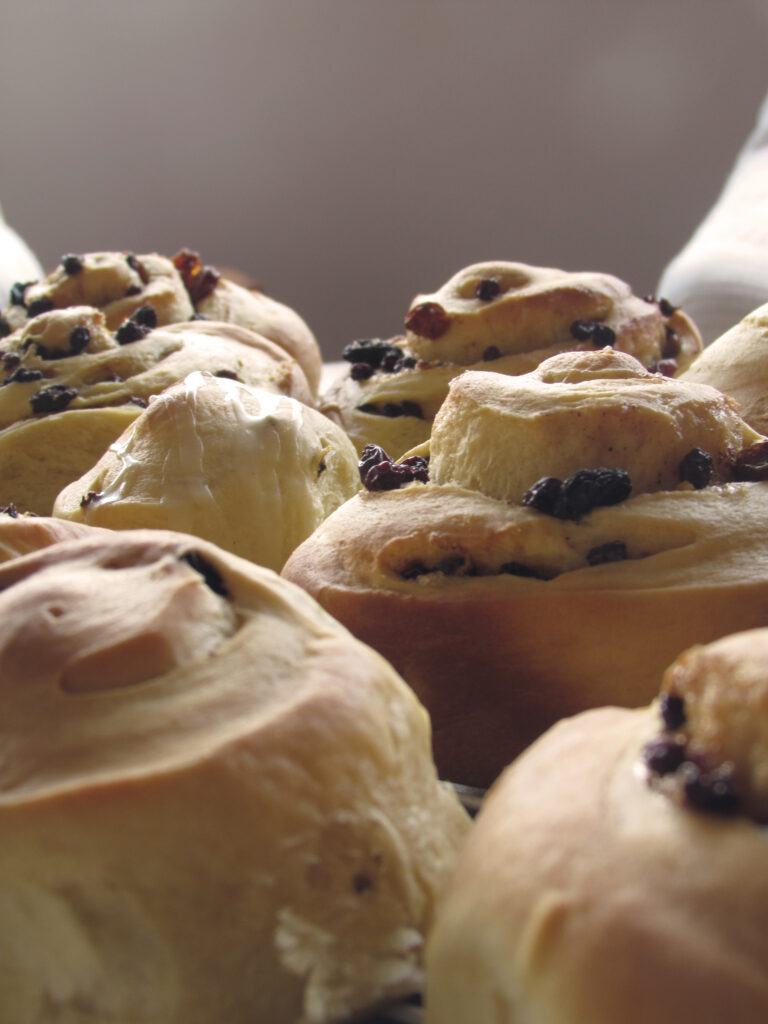 Freshly Baked Buns & Pastries Wallpaper: Golden Texture & Raisins