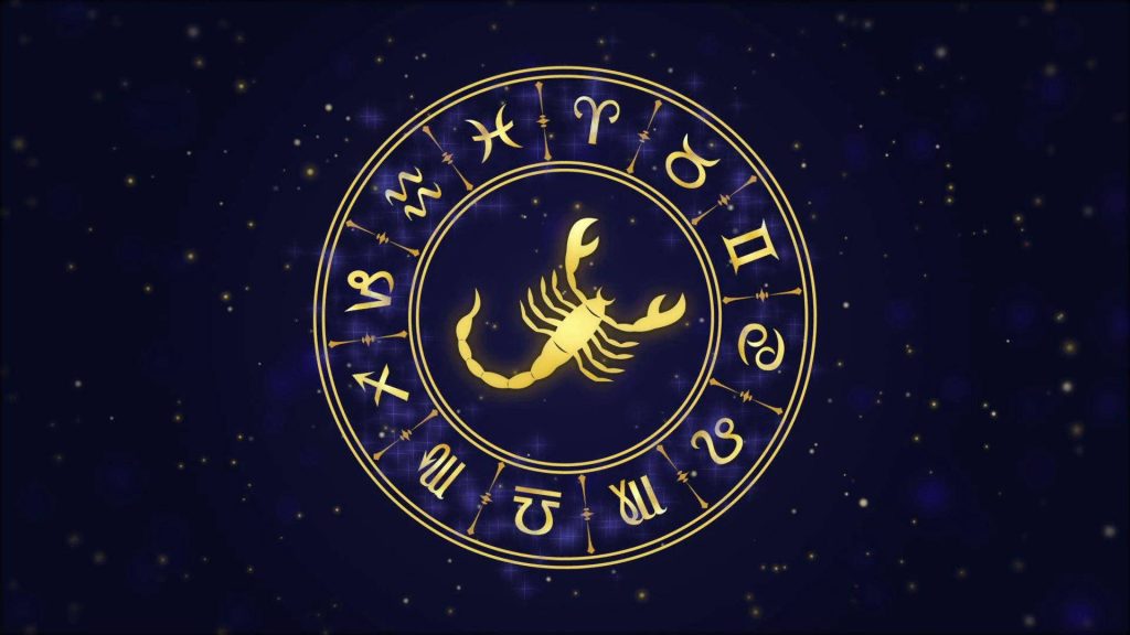 Golden Scorpio zodiac sign in ornate wheel on deep blue starry cosmic wallpaper background