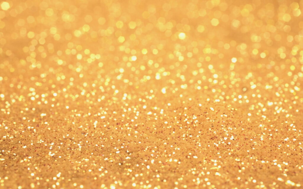 Experience the ultimate luxurious shine with this stunning gold textured HD wallpaper