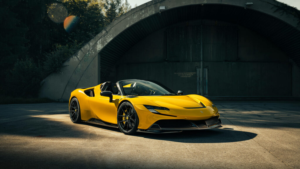 Golden Exclusivity: A Stunning Ferrari Adorned in Yellow Gracefully Takes Center Stage Against the Enigmatic Backdrop of an Abandoned Military Base Warehouse - A Captivating 5120x1440 Car Background Photo Wallpaper