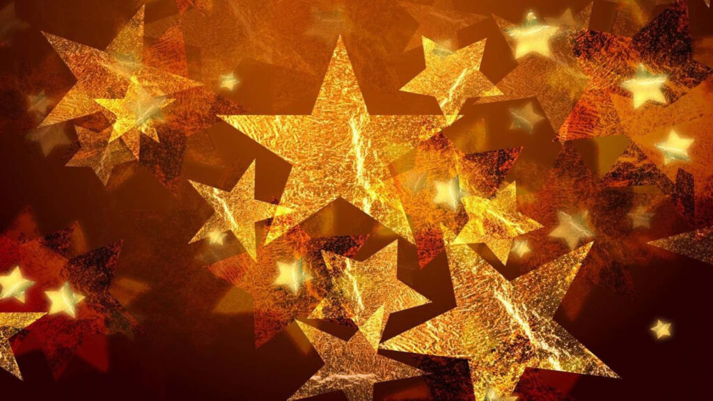 Festive Golden Stars Background for Cheerful Holiday Decor Wallpaper