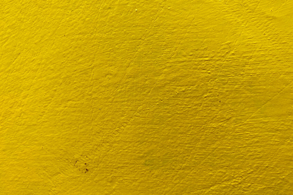 Minimalist Aesthetic: Gilded Stone Texture in Vibrant Yellow - HD Background Wallpaper