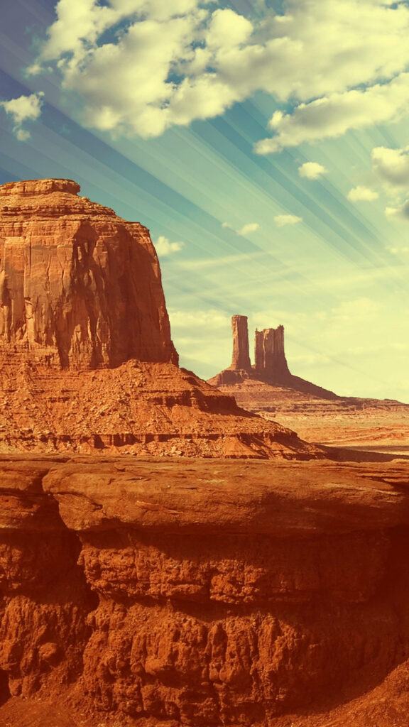 Stunning Western Cliffs Wallpaper: Golden Sunlit Desert Landscape