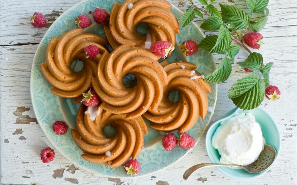 Golden Swirl Cookies with Raspberries - Rustic Wallpaper Background