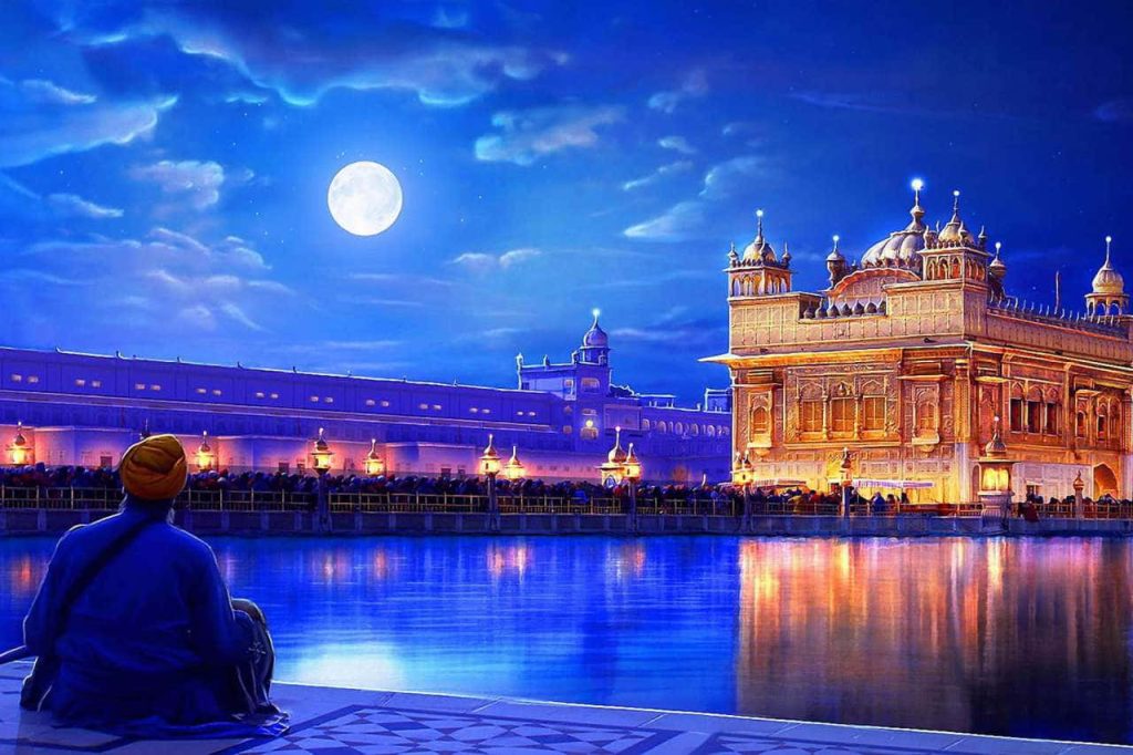 Golden Temple Amritsar glowing at night with devotee by water under full moon serene wallpaper
