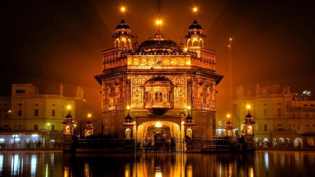 Golden Temple Amritsar night view glowing reflection serene Sikh spiritual architecture wallpaper
