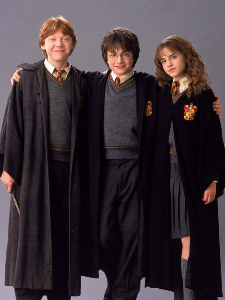 Golden Trio Wallpaper: Young Harry, Ron & Hermione in Gryffindor