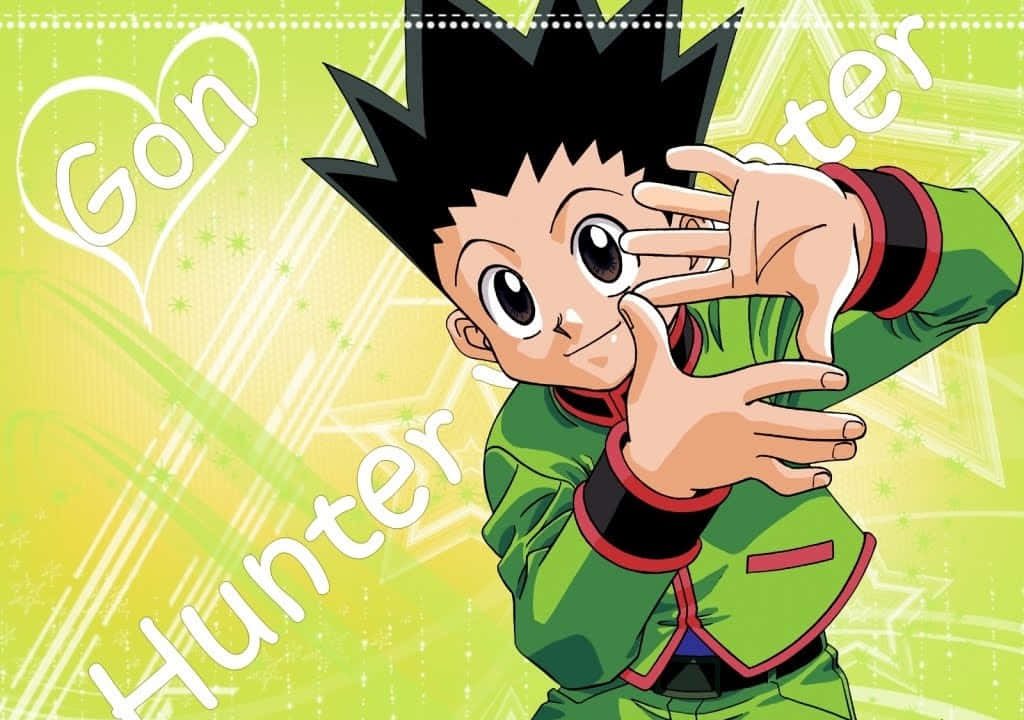 Gon Freecss from Hunter x Hunter 1999 anime with spiky hair green jacket star background wallpaper