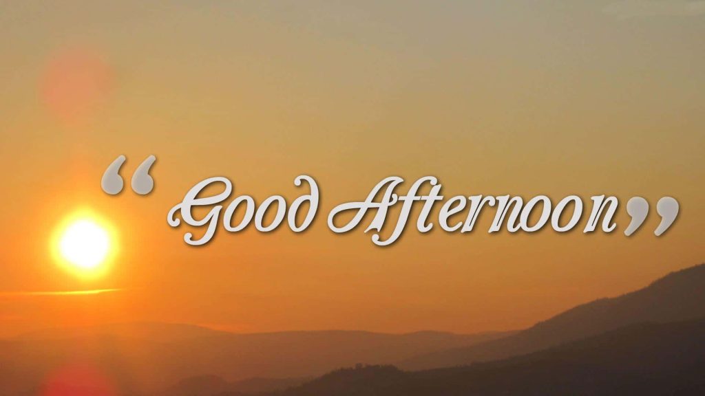 Good Afternoon greeting with golden sunset over rolling mountains and soft amber hues background Wallpaper