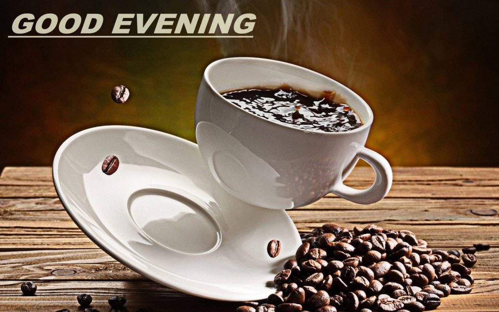 Good Evening coffee wallpaper with levitating white cup saucer and floating coffee beans on wood
