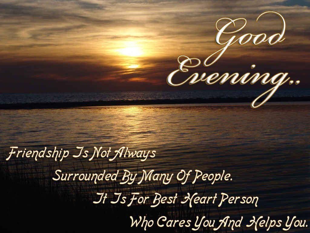 Golden sunset over calm water with Good Evening friendship quote for peaceful wallpaper background