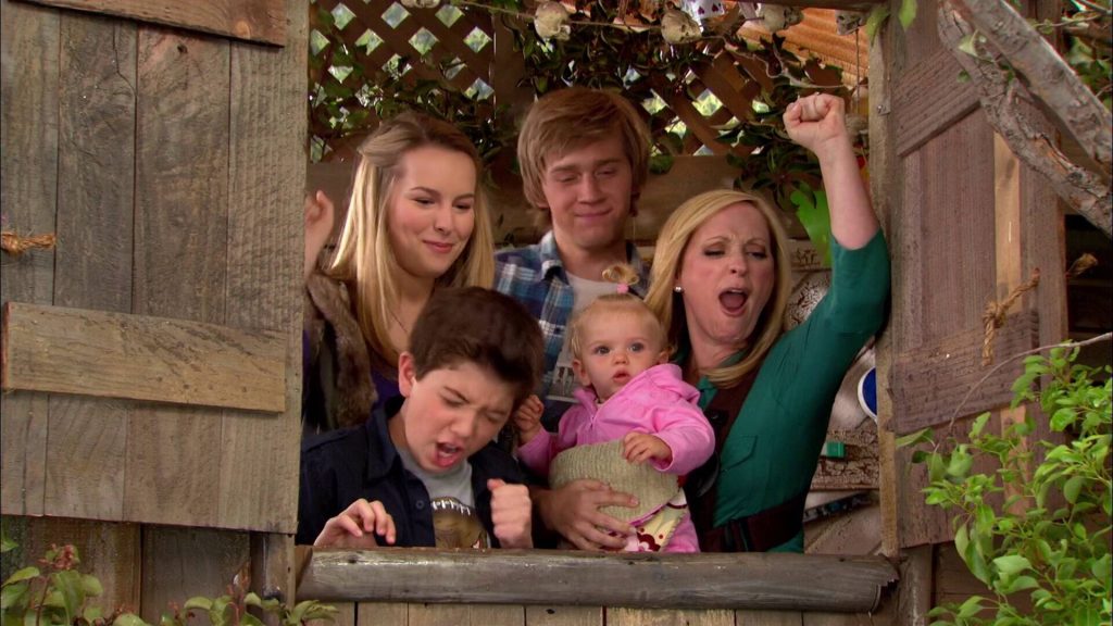 Good Luck Charlie Duncan family cheers in rustic wooden playhouse lively sitcom scene wallpaper