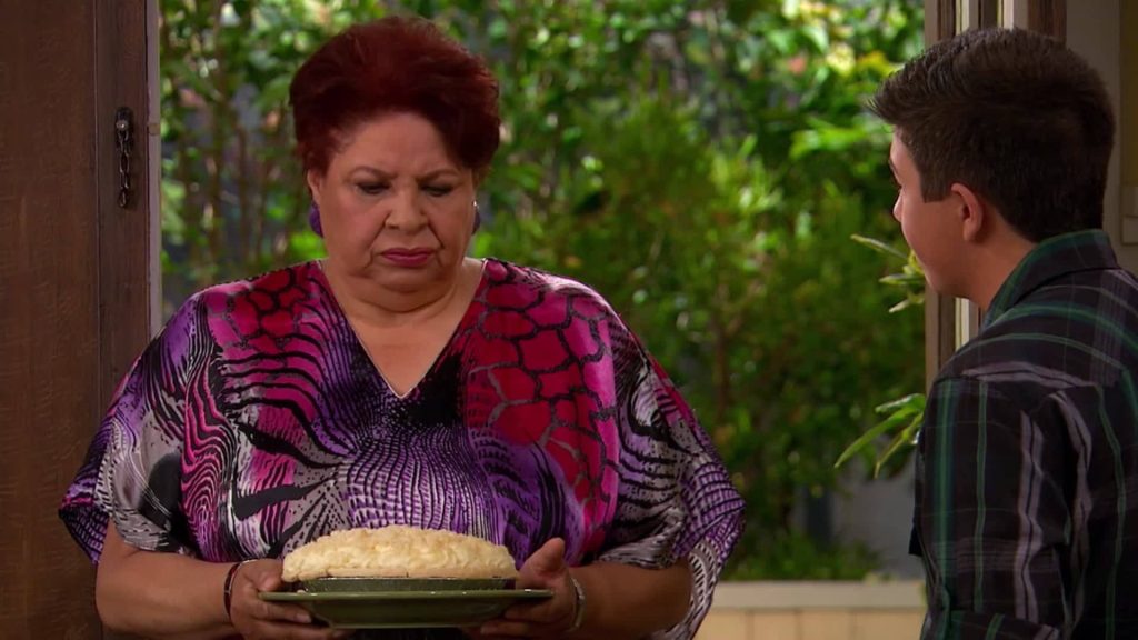 Good Luck Charlie wallpaper Mrs Dabney holding pie looking at Gabe Duncan vibrant top indoors