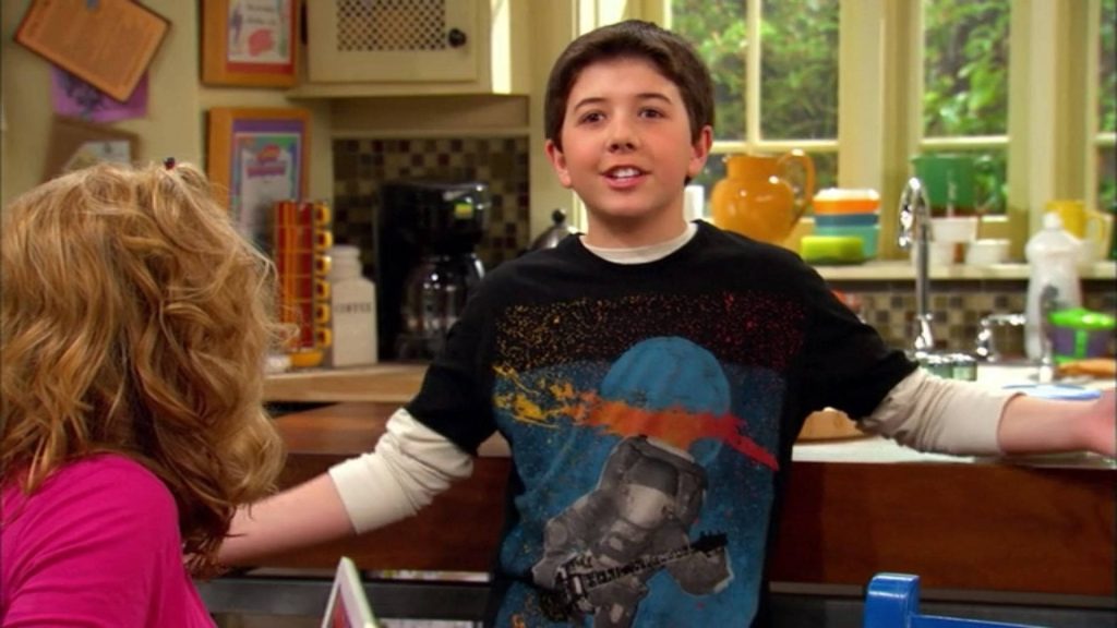 Good Luck Charlie wallpaper Gabe Duncan in space tee in bright kitchen Disney Channel sitcom