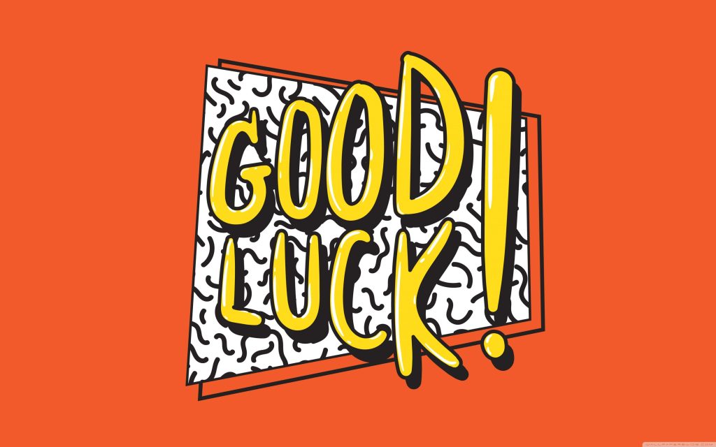Good Luck wallpaper with bold yellow text retro comic style black white squiggle pattern orange background