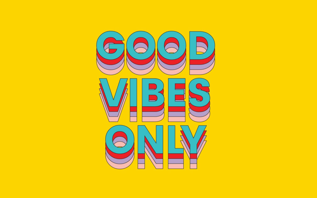 Good Vibes Galore: A Joyful Yellow Wallpaper with Glitching Colors and Inspiring Text
