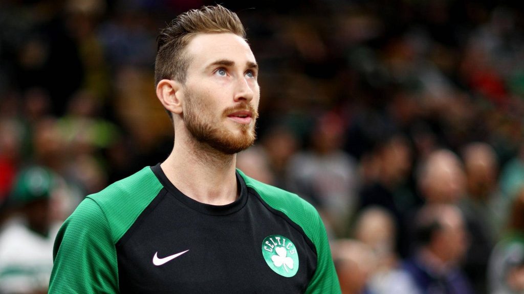 NBA star Gordon Hayward in Boston Celtics jersey intense focused stadium lighting wallpaper