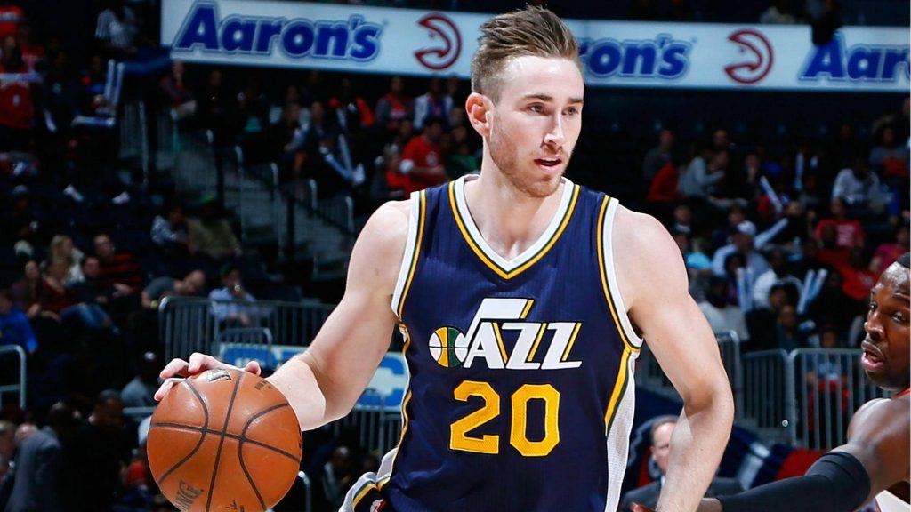 NBA star Gordon Hayward dribbling in Utah Jazz number 20 jersey intense game action wallpaper