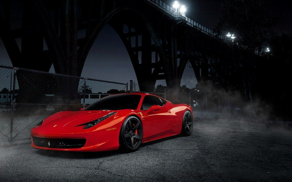 Captivating Beauty: Unveiling the Stunning Red Ferrari 458 Italia in a Picturesque Setting Wallpaper