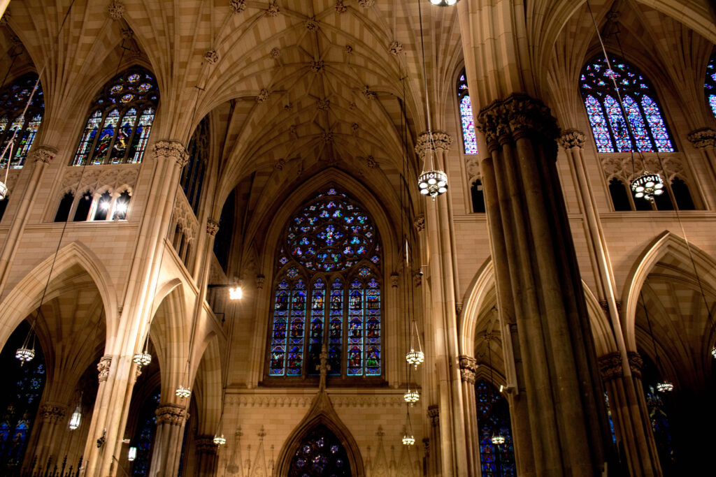 Gothic Cathedral Wallpaper: Majestic Arches & Stained Glass Design
